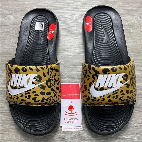 nike leopard sliders